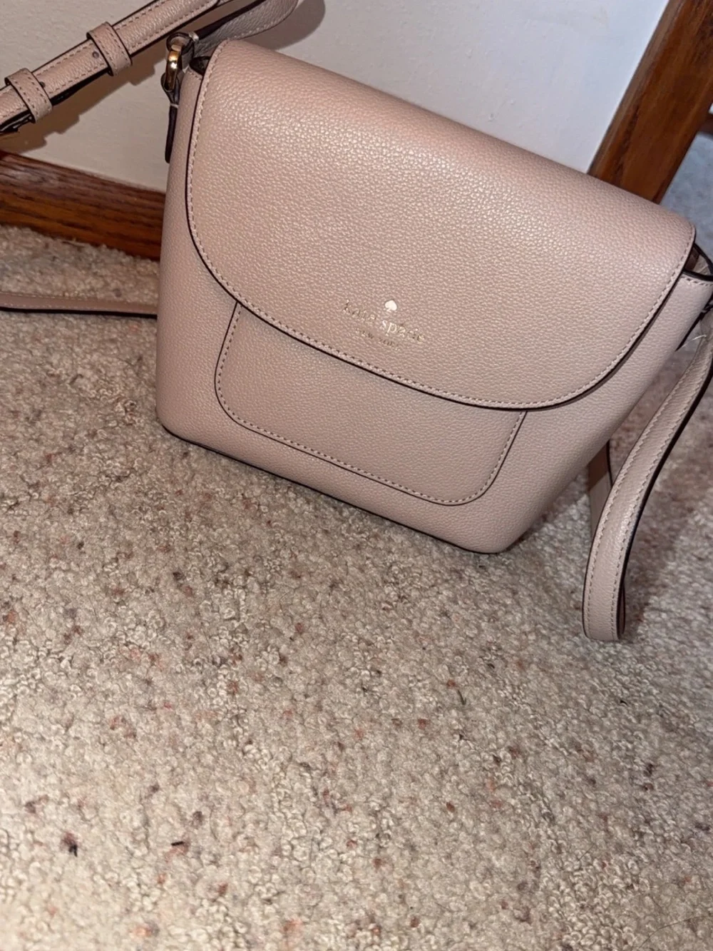 kate spade cream pebbled leather flap crossbody